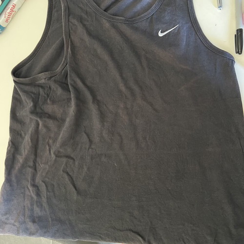 Nike sleeveless shirt used with slight sun discoloration, size M, black and blue