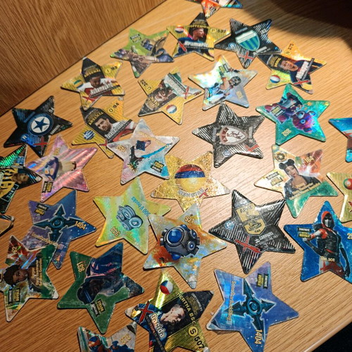 Set of 31 used metal star-shaped tags