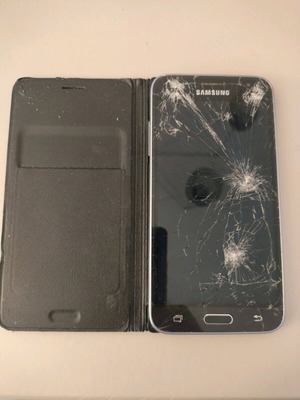 Samsung J3 (2016) used for parts or repair with case