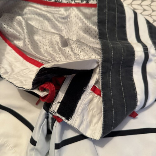 Men's surf style swim shorts striped white black with red cord size L used
