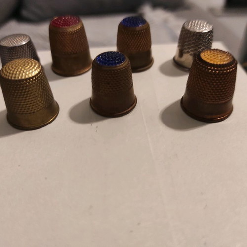 Lot of 7 vintage thimbles used