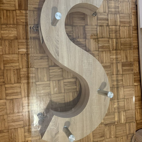 Coffee table with natural wood and glass top