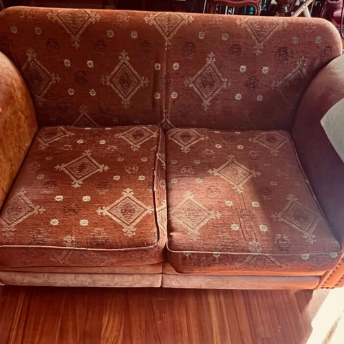 Classic two-seater sofa with fabric and leather upholstery