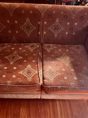 Classic two-seater sofa with fabric and leather upholstery