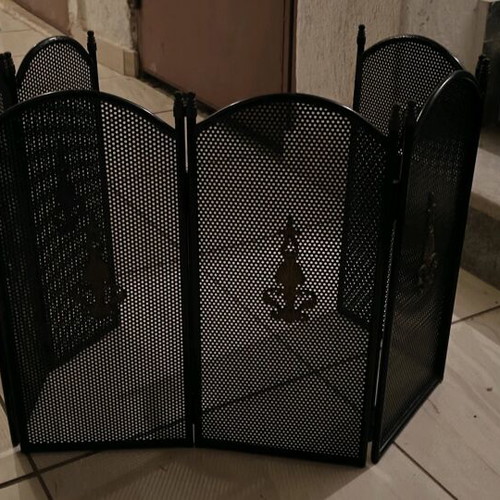 Bronze fireplace cover like new with gold details