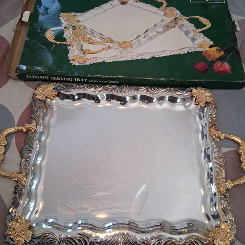Elegant serving tray with golden handles
