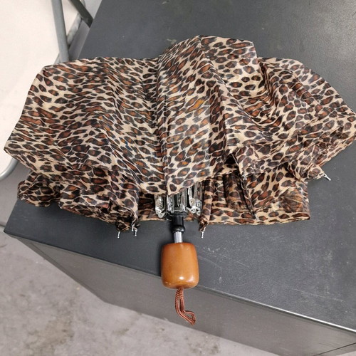 Small umbrella used, beige