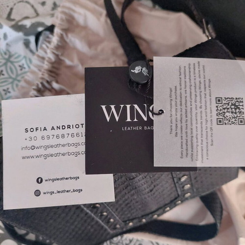 Wings shoulder bag handmade new, black with studs