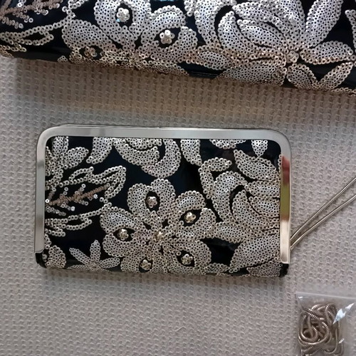 Clutch bag with floral gold sequin embroidery and matching wallet