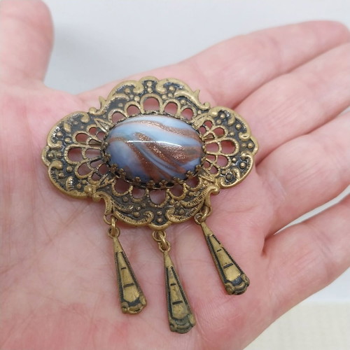 Vintage brass brooch with pendants and cabochon
