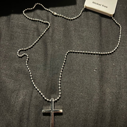 Steel cross new, silver color, does not tarnish