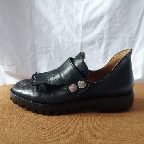 Women's black leather loafers with tassels and snap buttons, size 37