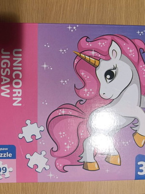 Unicorn puzzle like new, 99 pieces