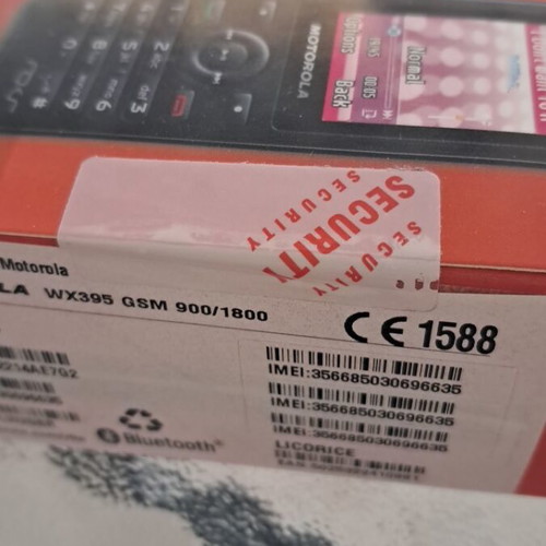 Motorola WX395 mobile phone, sealed in box