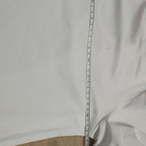 White top with statement sleeves and metal chain like new