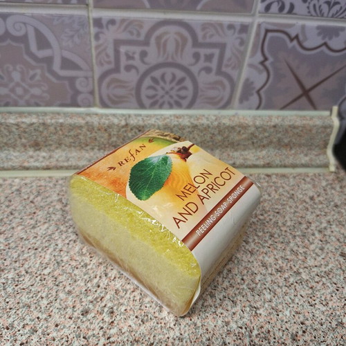 Body peeling soap and sponge new with melon and apricot extract