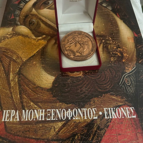 Collectible commemorative medal and luxury album set, like new