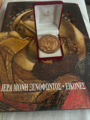 Collectible commemorative medal and luxury album set, like new
