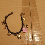 Bracelet new with fuchsia and gold decorative elements