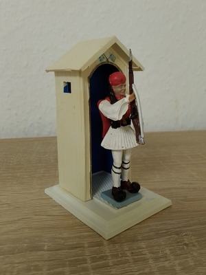 Athina Evzones figure in presenting stance used