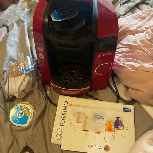 Espressiera coffee maker used, with papers