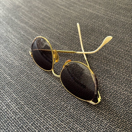 Vogart vintage sunglasses used with gold frame and silver details