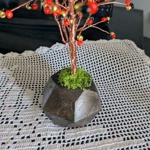 Decorative handmade tree with plaster base and painted details