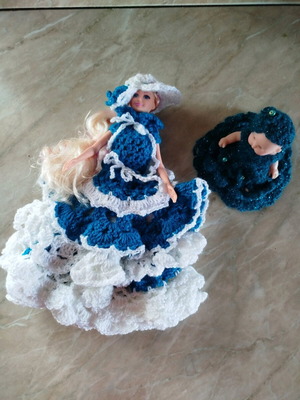 Doll set with handmade crocheted dresses new