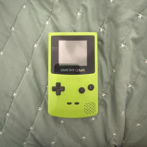 Game Boy Colour light green used with Pokemon Silver, Gold, Yellow cartridges