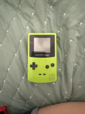 Game Boy Colour light green used with Pokemon Silver, Gold, Yellow cartridges