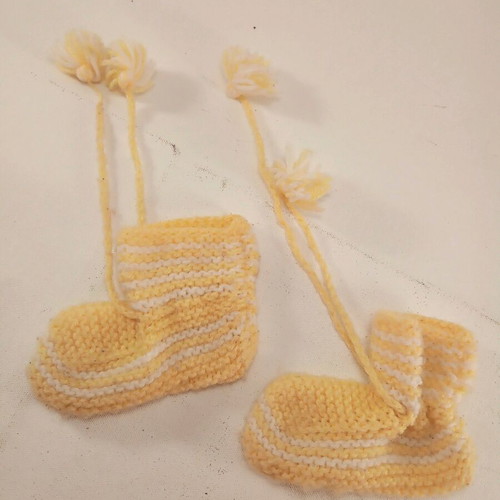 Knitted baby booties with tassels handmade like new