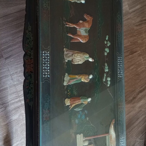 Carved table with folding legs used, traditional Chinese design