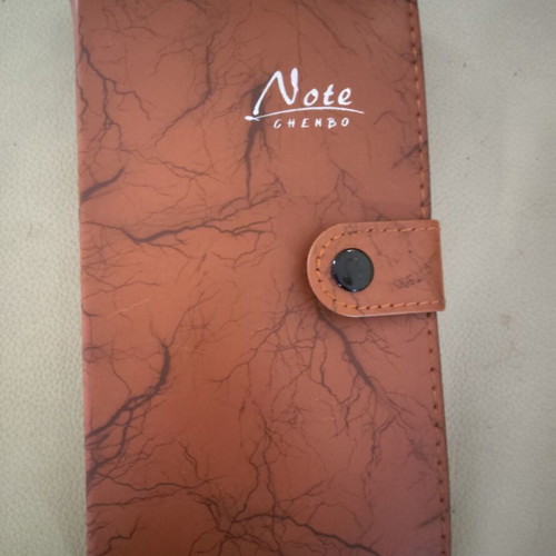 Chenbo pocket diary with brown faux leather cover, like new