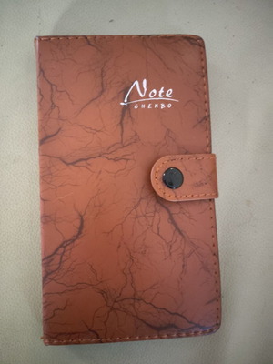 Chenbo pocket diary with brown faux leather cover, like new