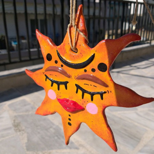 Handmade hanging clay sun new