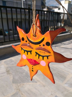 Handmade hanging clay sun new