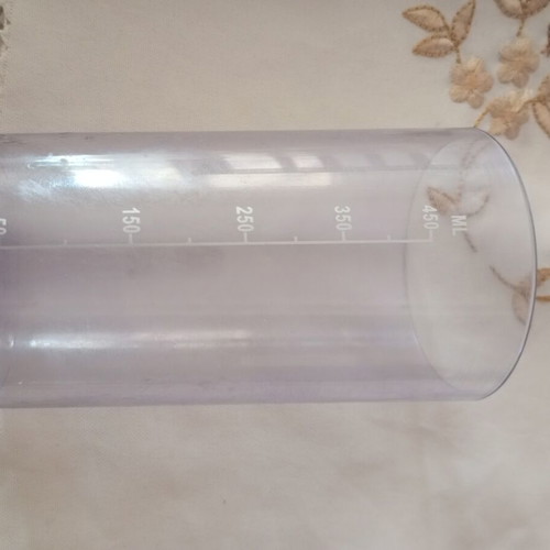 Measuring cup, cloudy with marks