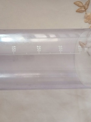 Measuring cup, cloudy with marks