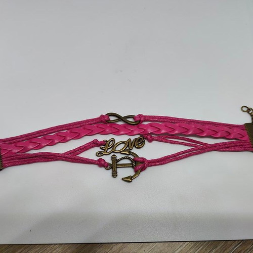 Handmade fuchsia multilayer bracelet with bronze elements like new
