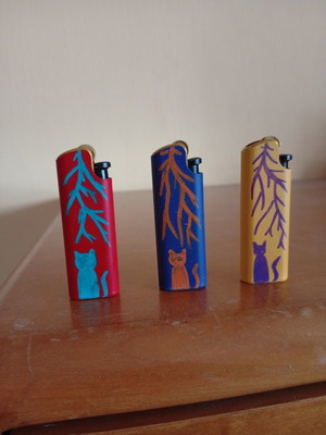 Hand-painted lighters with cat design, set of 3