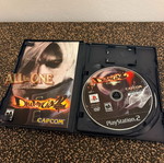 Devil May Cry 2 PS2 game, complete with manual
