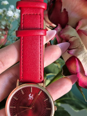 Red women's watch with leather strap like new