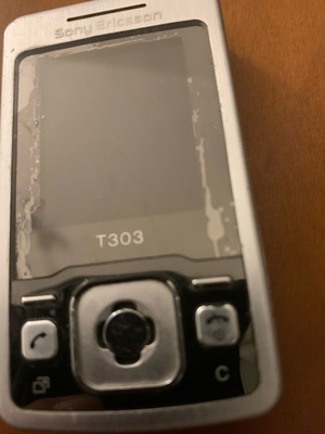 Sony Ericsson T303 used compact slider mobile phone 2008 silver