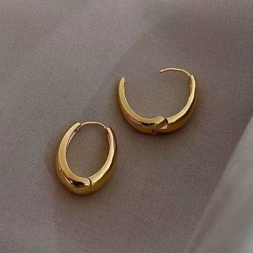 Classic copper alloy earrings gold color, new, size 24x18mm