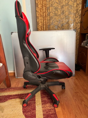 Gaming swivel chair used, two-tone red and black