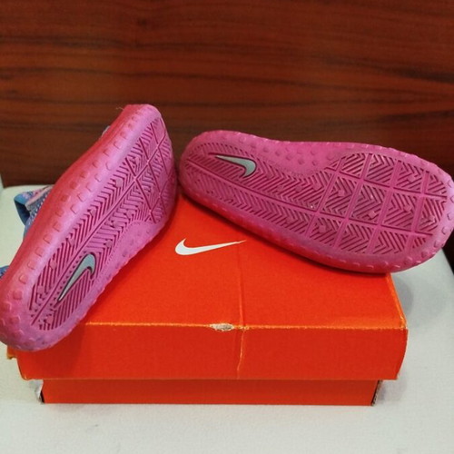 Nike kids sea shoes used size 23 pink and purple