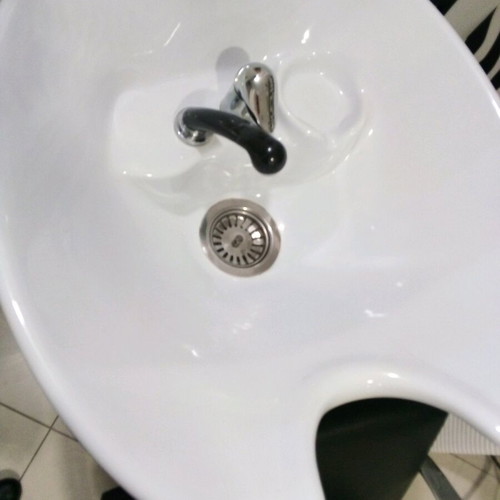 Hair salon chair used with leather seat and stainless steel arms