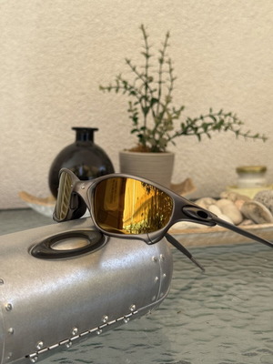 Oakley Juliet X-Metal sunglasses with gold iridium polarized lenses