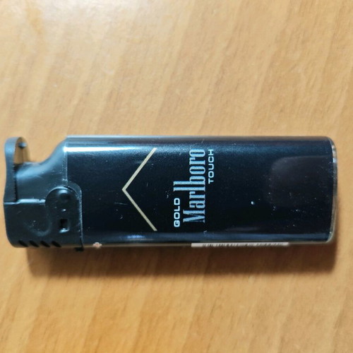 Marlboro collectible windproof lighter used, functional