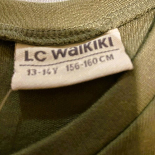 Walk dress new, khaki with front pockets, age 13-14